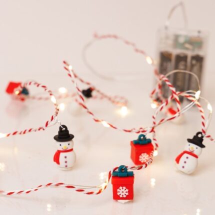 Χριστουγεννιάτικη σειρά 20 Mini LED με χιονάνθρωπο και κουτί δώρου, θερμό λευκό φωτισμό, λειτουργία μπαταρίας και χρονοδιακόπτη. Ιδανική για εσωτερική γιορτινή διακόσμηση.